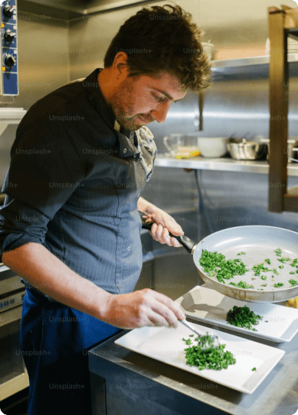 chef holding plate